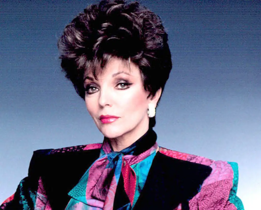 Joan Collins as Alexis Colby in Dynasty wearing shoulder pads circa 1981.